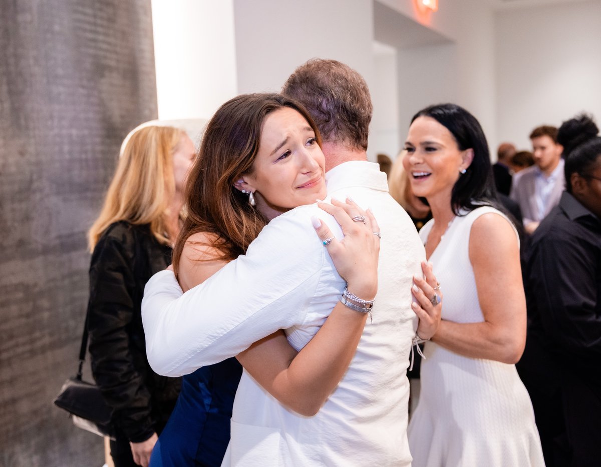 Annabella Bernhardt, who turned 19 the night of the party, shares an embrace with dad, Alex Bernhardt, Jr.